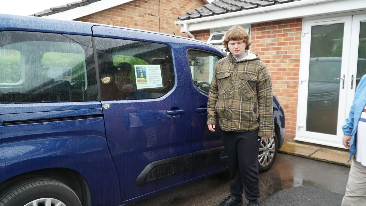 Outside my new how with my car