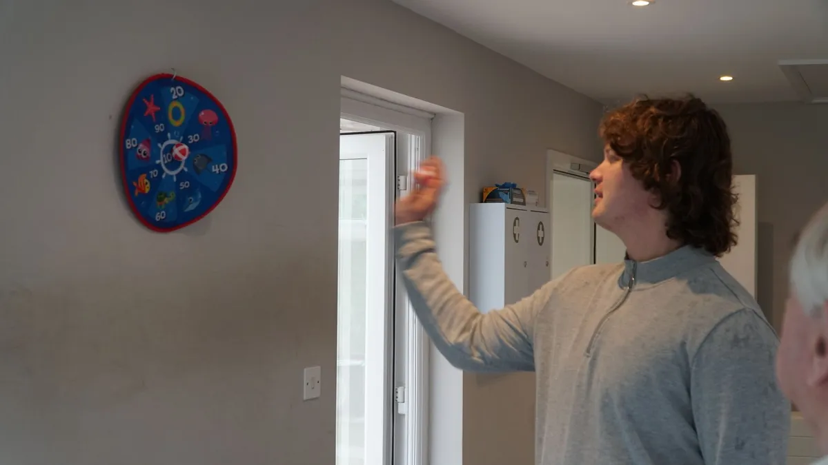 Playing soft darts with my dad